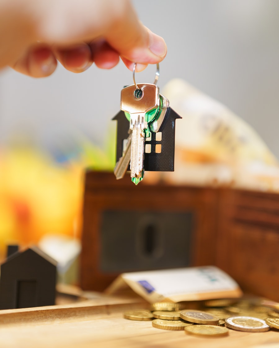 A hand holding the keys to a new home